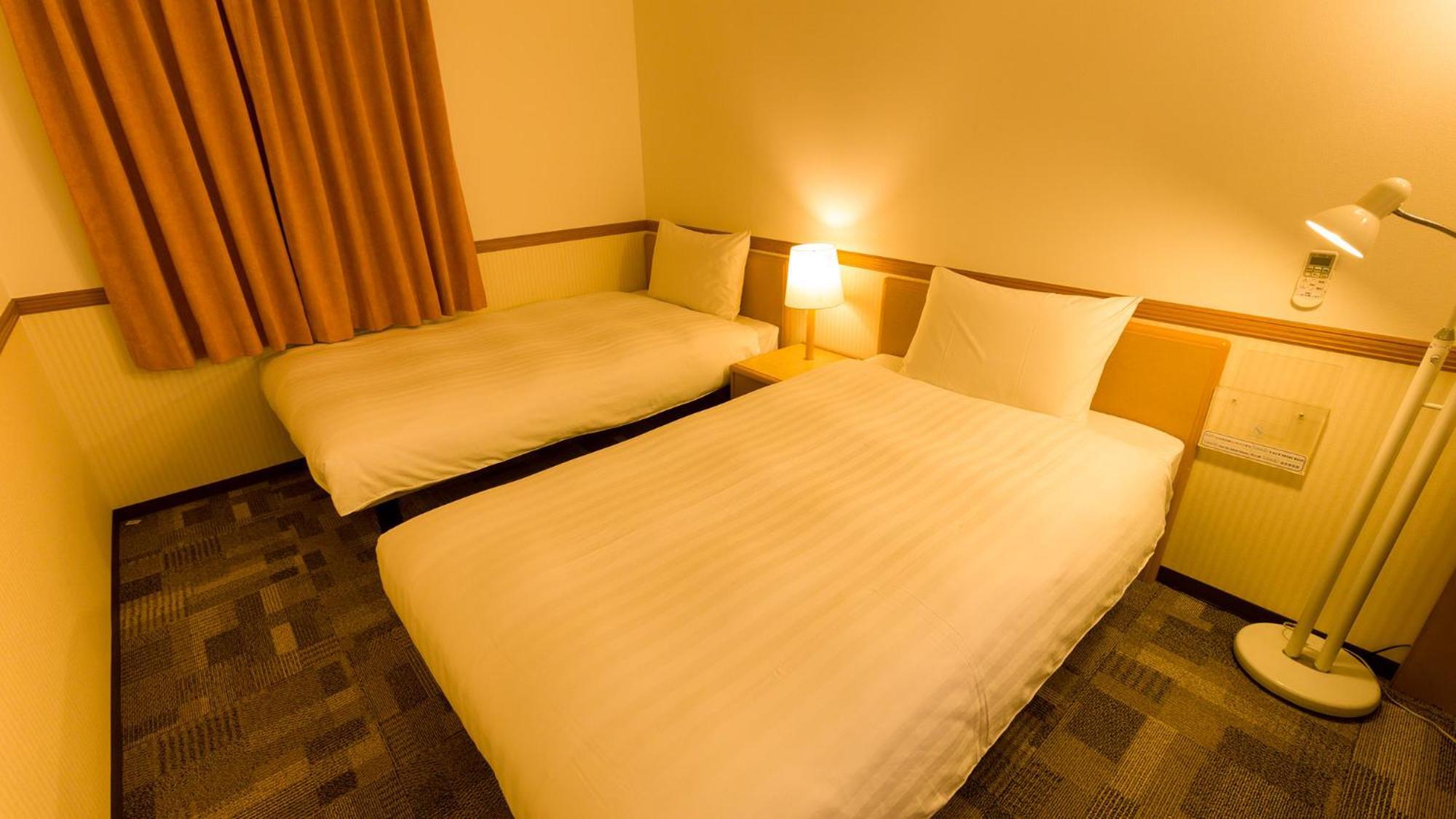 Toyoko Inn Tsushima Izuhara Номер фото