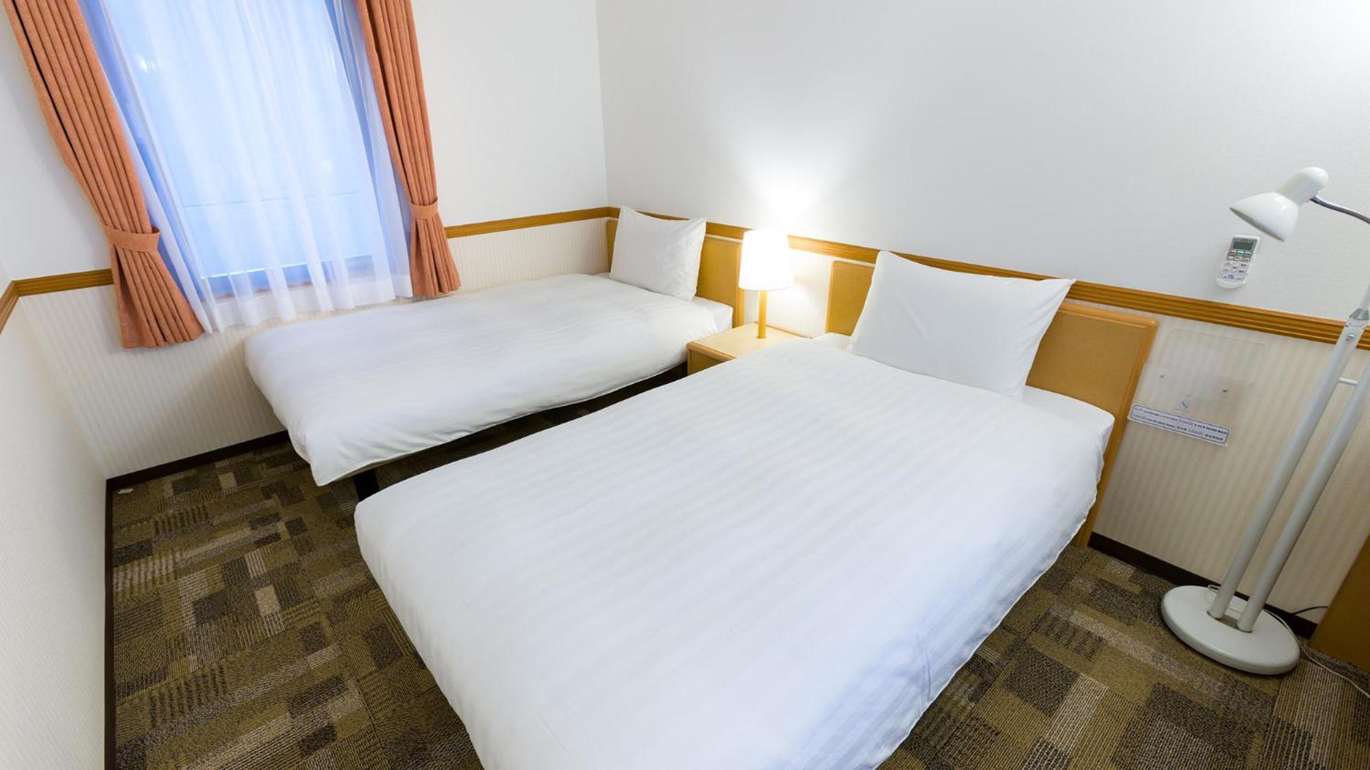 Toyoko Inn Tsushima Izuhara Номер фото